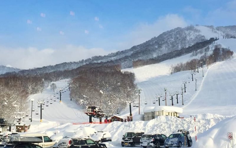 Looking up from the base of Moiwa resort at some of the snow covered ski trails